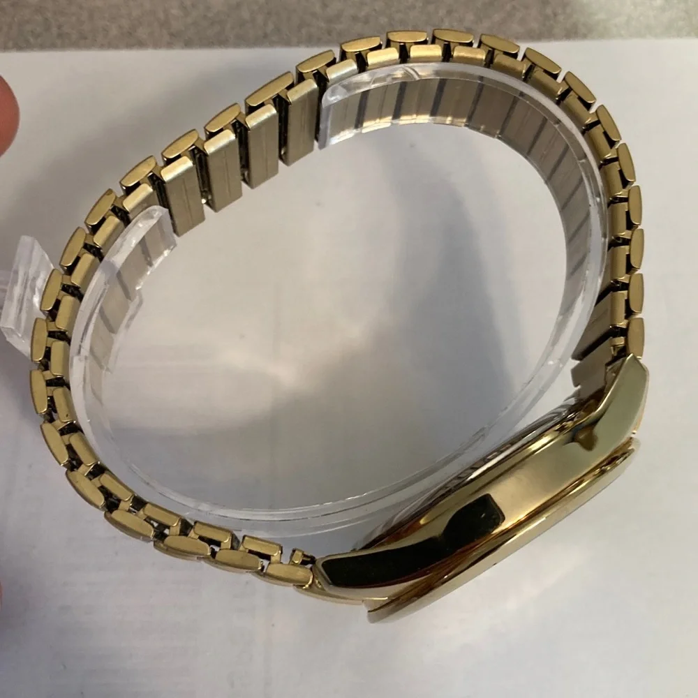 Timex gold tone Perpetual Calendar watch, stretch bracelet, new battery, indiglo